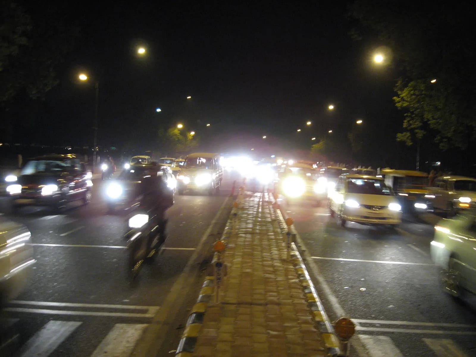 Light trails from evening traffic on a wide Delhi road